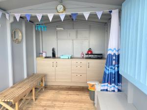 photo 2 of Beach hut 228 low wall  for hire Frinton-on-Sea